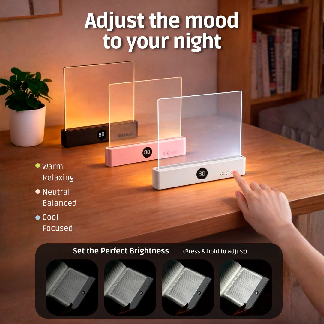 Tabletop light with digital display and touch control on a wooden surface, surrounded by books and a plant.
